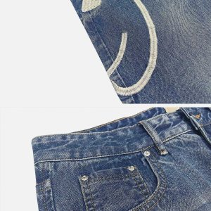 retro washed jeans with cartoon embroidery youthful appeal 3394