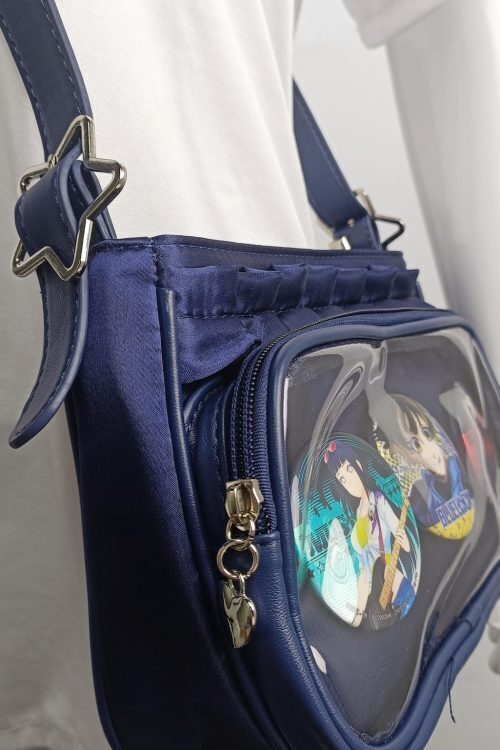 Blue Ita Crossbody Bag with Clear Window and Included Insert for Pin Display