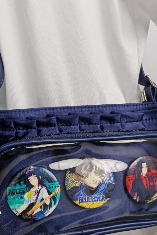 Blue Ita Crossbody Bag with Clear Window and Included Insert for Pin Display
