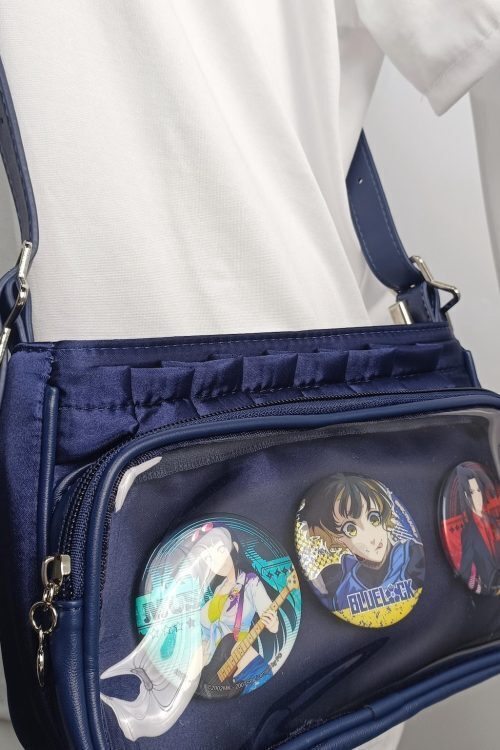 Blue Ita Crossbody Bag with Clear Window and Included Insert for Pin Display