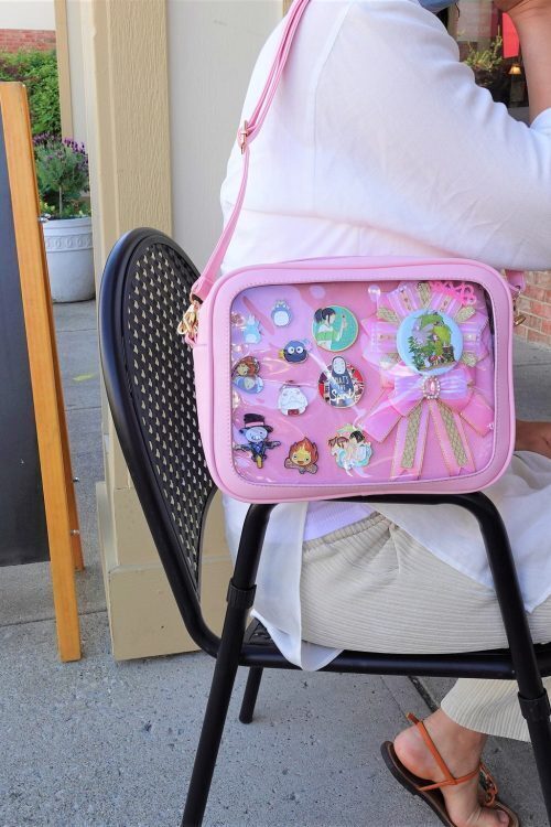 Gold Ita Crossbody Bag with Clear Window and Included Insert for Pin Display