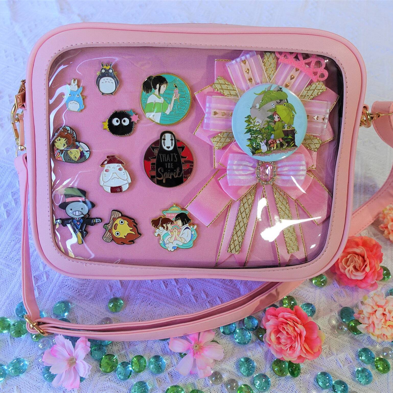 Gold Ita Crossbody Bag with Clear Window and Included Insert for Pin Display Gold Ita Crossbody Bag with Clear Window and Included Insert for Pin Display