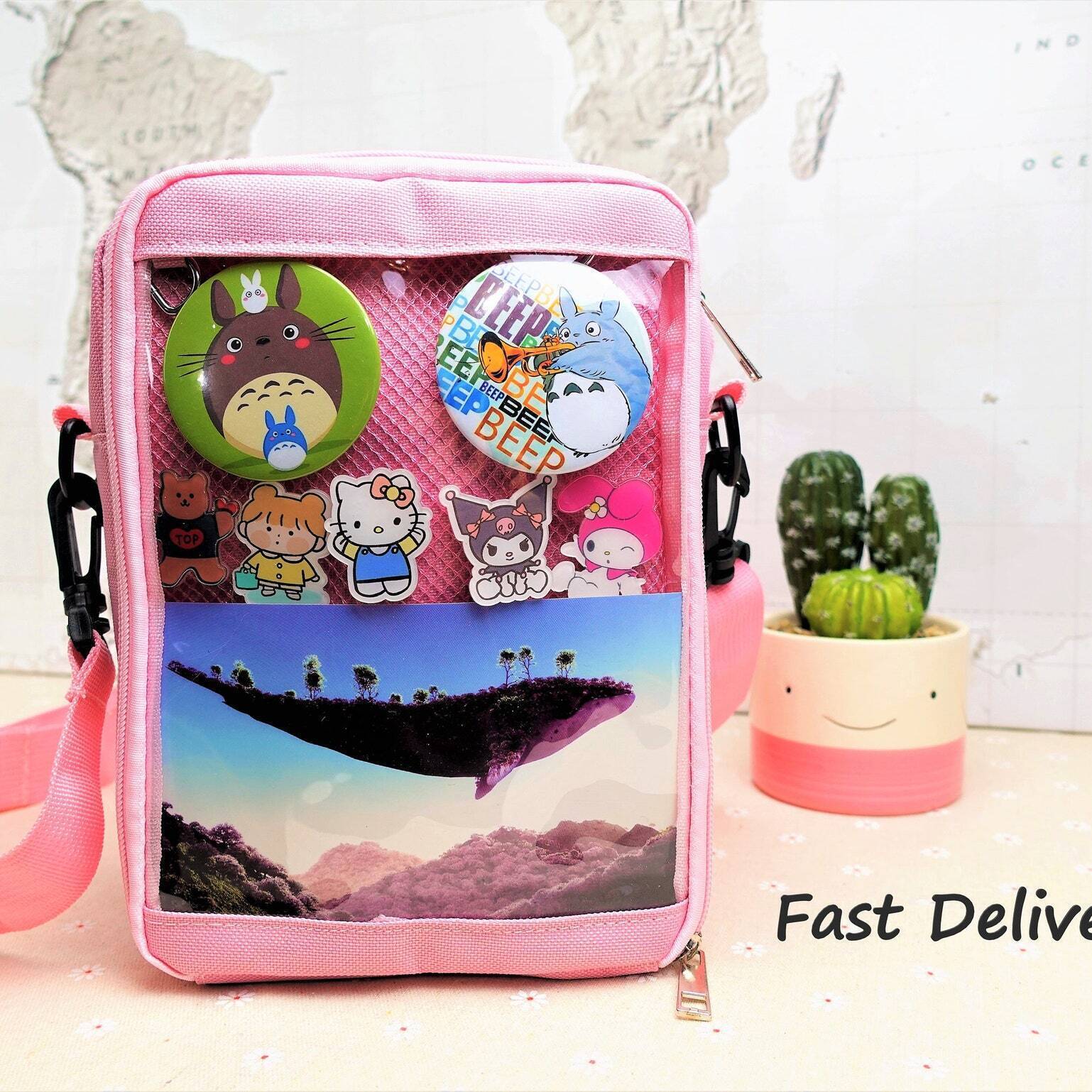 Small Ita Crossbody Bag with Clear Window for Pin Display Small Ita Crossbody Bag with Clear Window for Pin Display